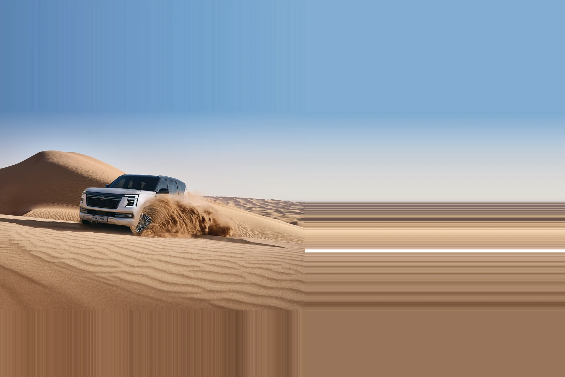 Новый Nissan Patrol Y63 в движении по дюнам
