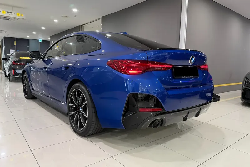 Заказать BMW 420i M Sport Pro Gran Coupe 2025 2.0 л 184 л.с Бензин с пробегом 5 081 км, Автомат, Задний привод, цвет Синий, поставка из Германия, доставка по РФ 4 Series 420i M Sport Pro Gran Coupe — фото 3