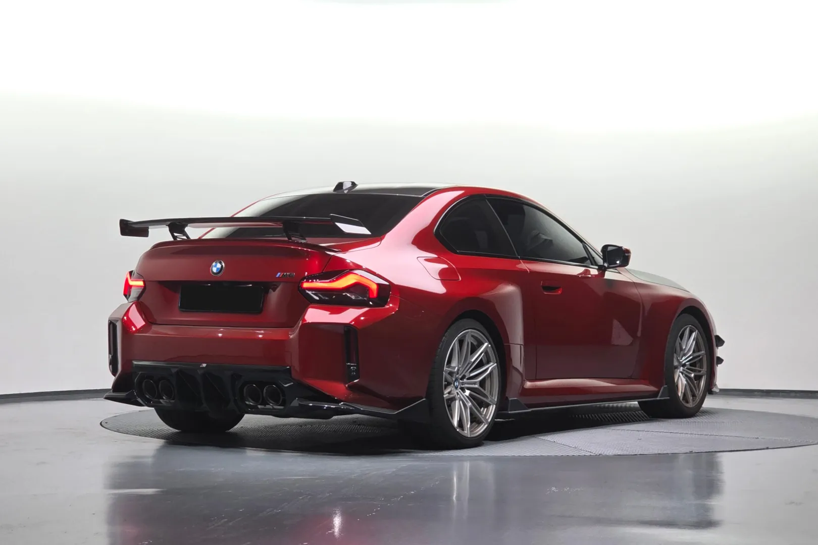 Заказать BMW M2 2025 3.0 л 460 л.с Бензин с пробегом 4 903 км, Автомат, Задний привод, цвет Красный, поставка из Германия, доставка по РФ