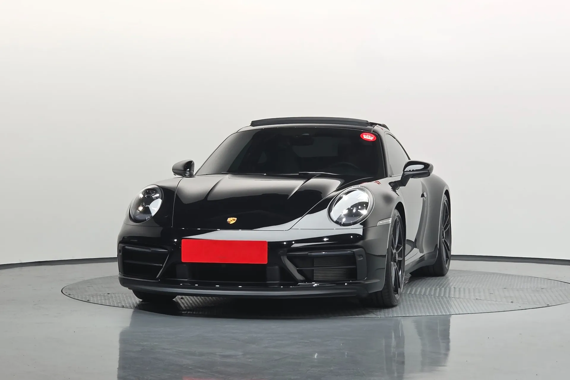 Заказать Porsche 911 (992) Carrera 4 GTS 2024 3.6 л 541 л.с Бензин с пробегом 3 821 км, Автомат, Полный привод, цвет Чёрный, поставка из Германия, доставка по РФ