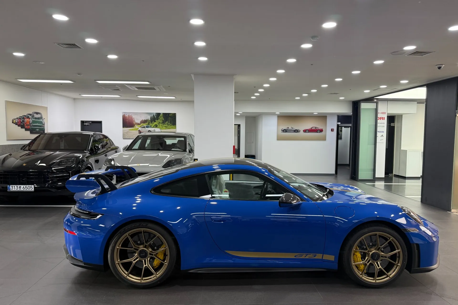 Заказать Porsche 911 GT3 2025 4.0 л 510 л.с Бензин с пробегом 398 км, Автомат, Задний привод, цвет Синий, поставка из Германия, доставка по РФ
